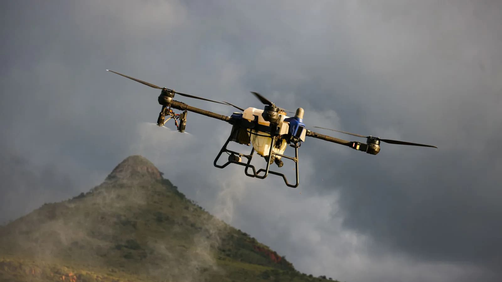 Drone flying above a mountainous landscape
