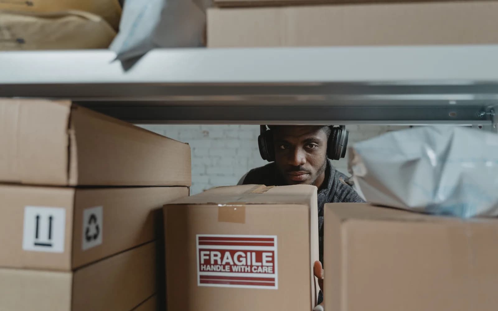 Parcels prepared on shelves in a retail fulfilment workspace
